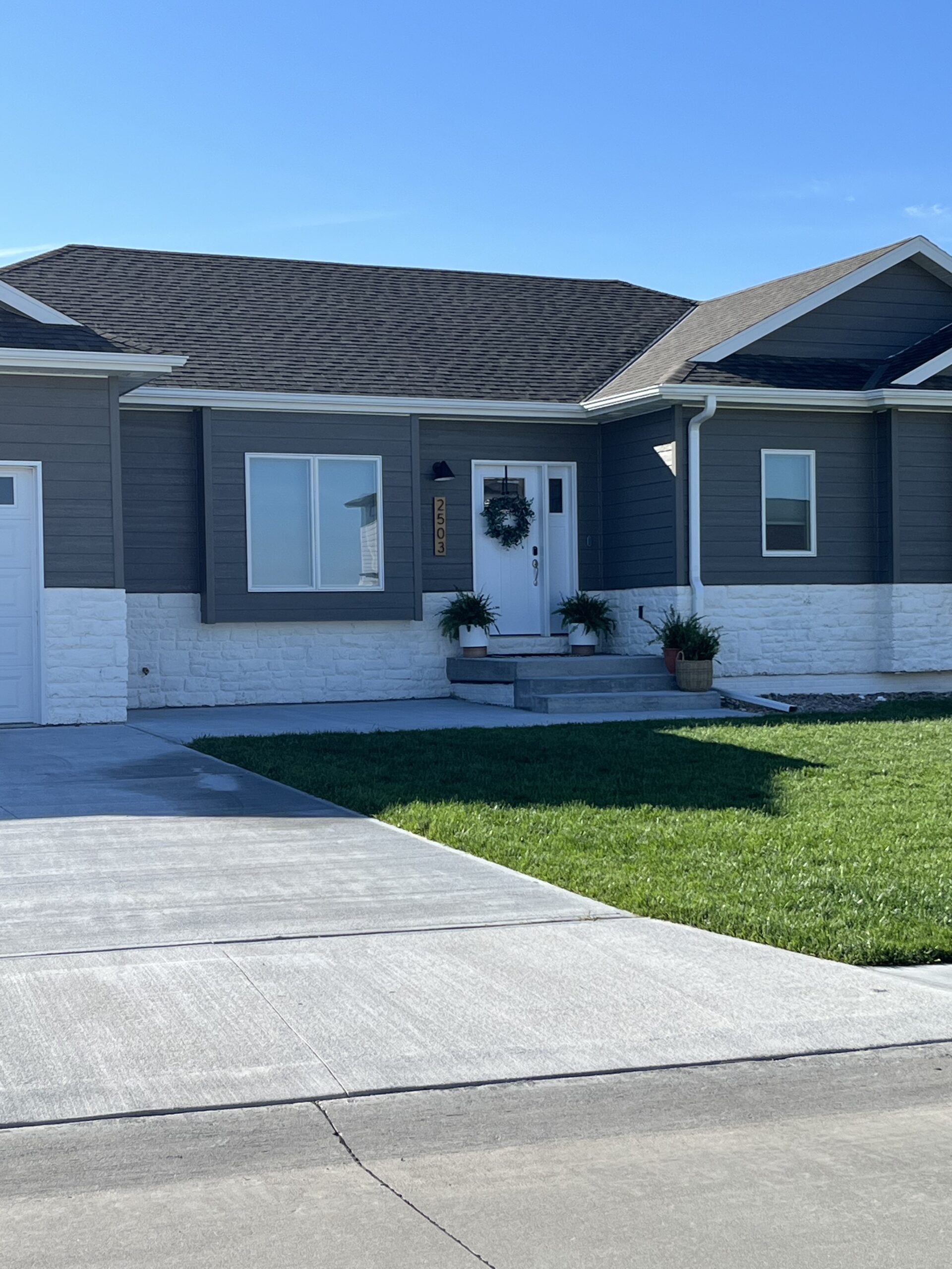 Limewashed Stone Exterior Home - Berry Berry Quite Contrary